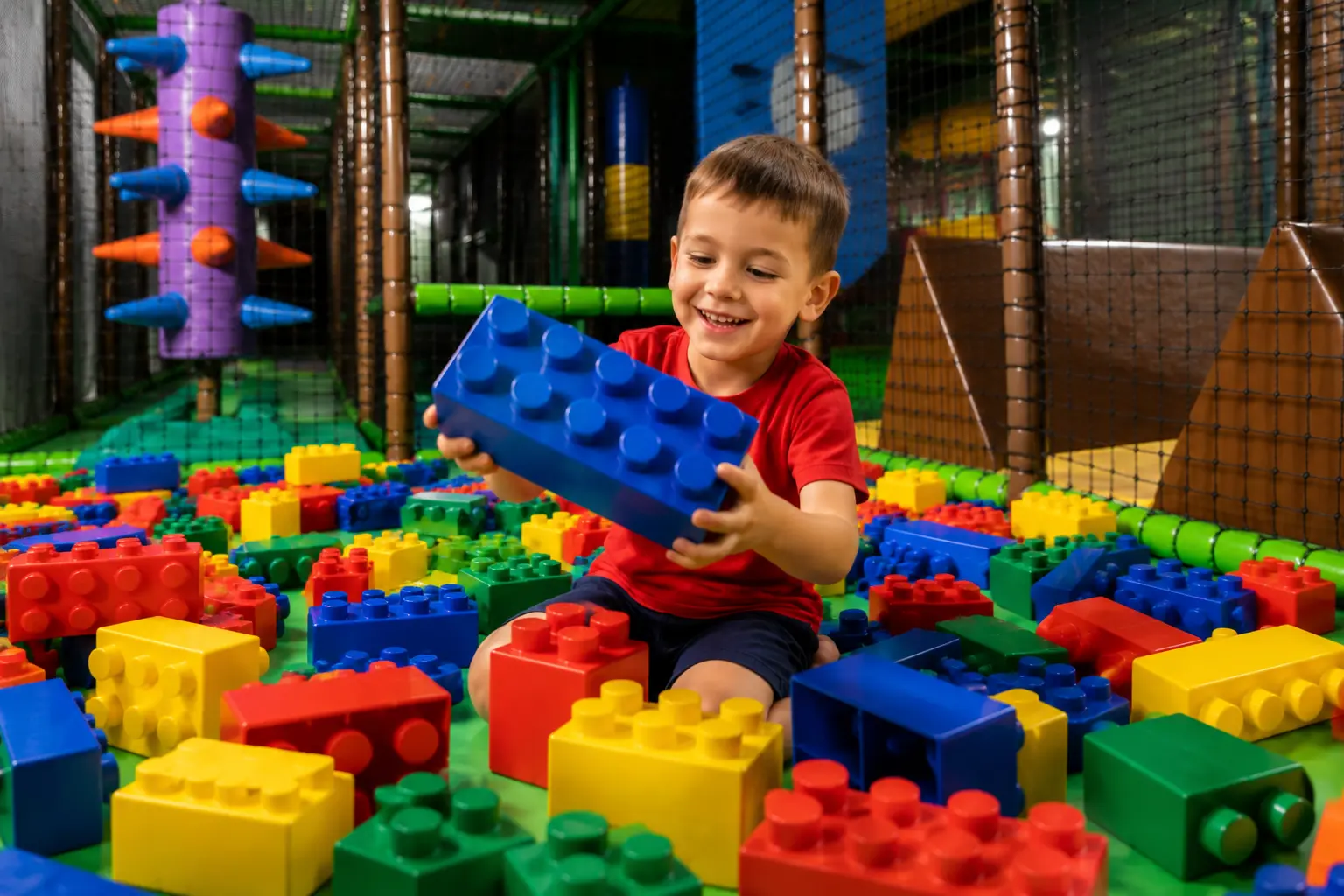 Enfant jouant au lego XXL